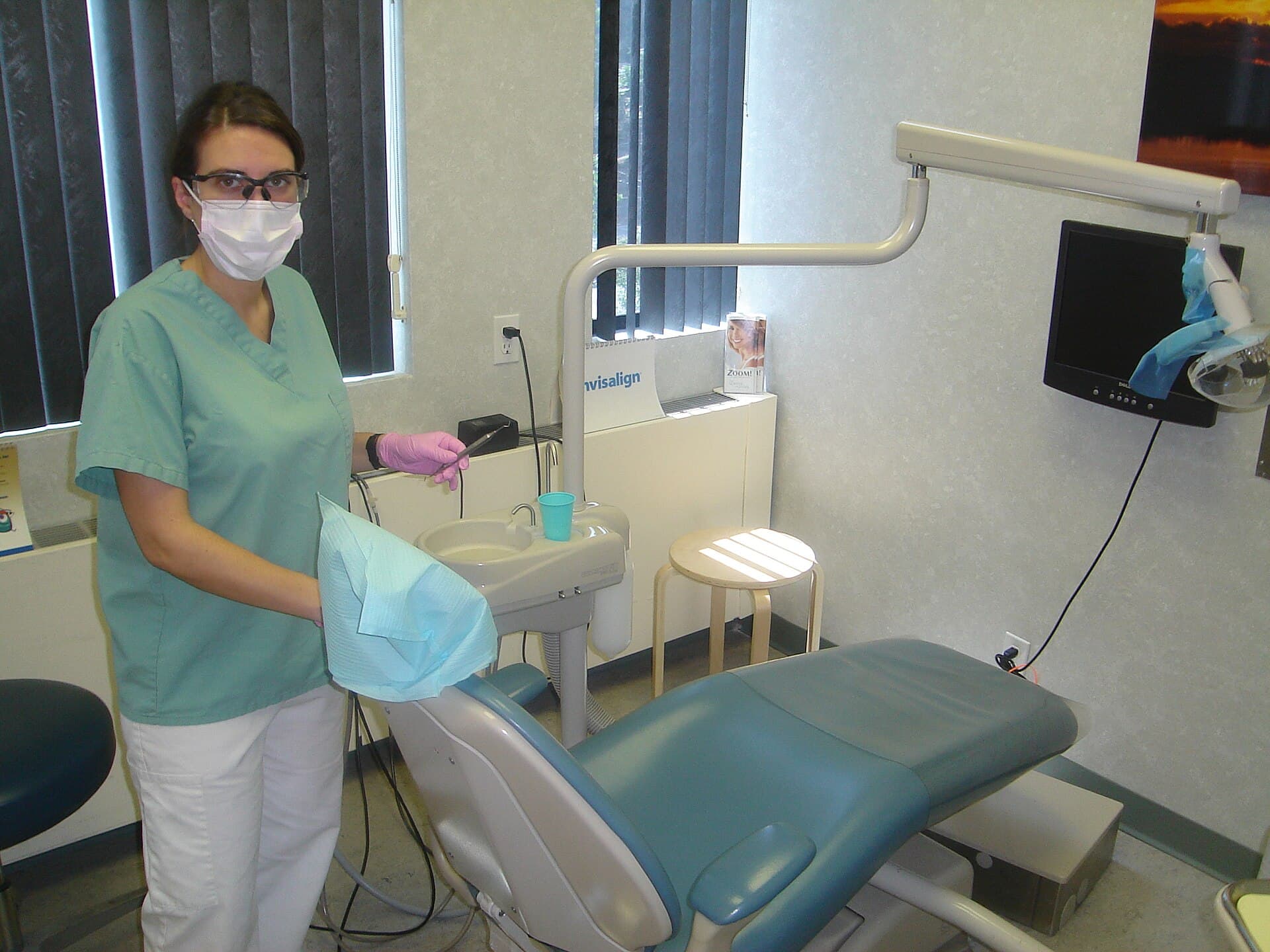 A dental hygienist working in a clinic
