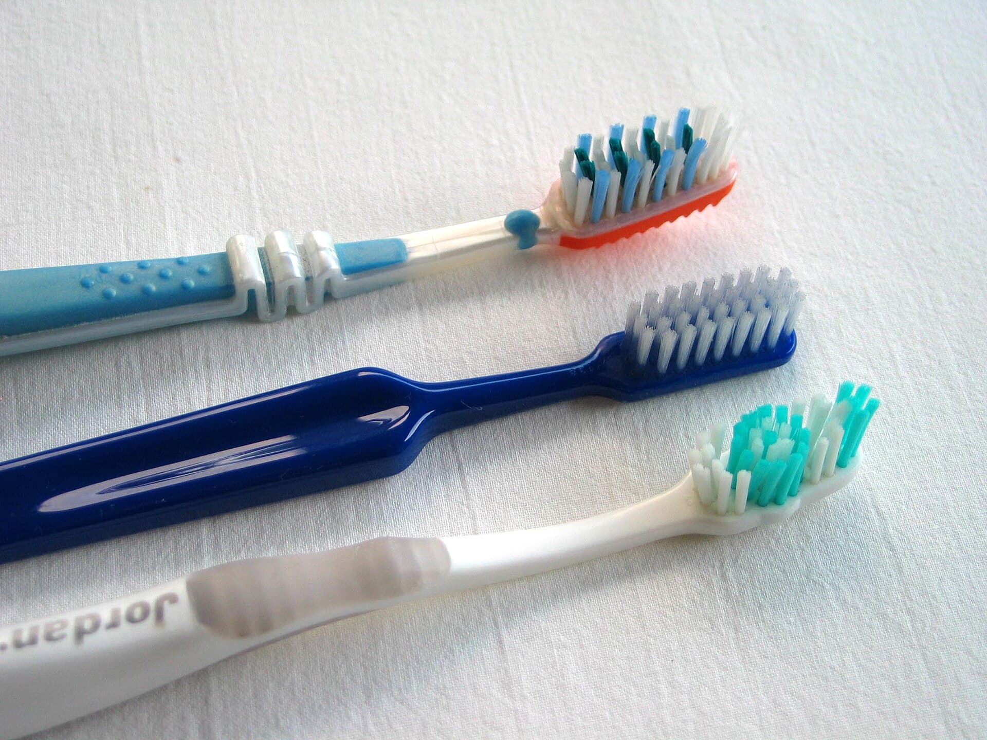 Three manual toothbrushes